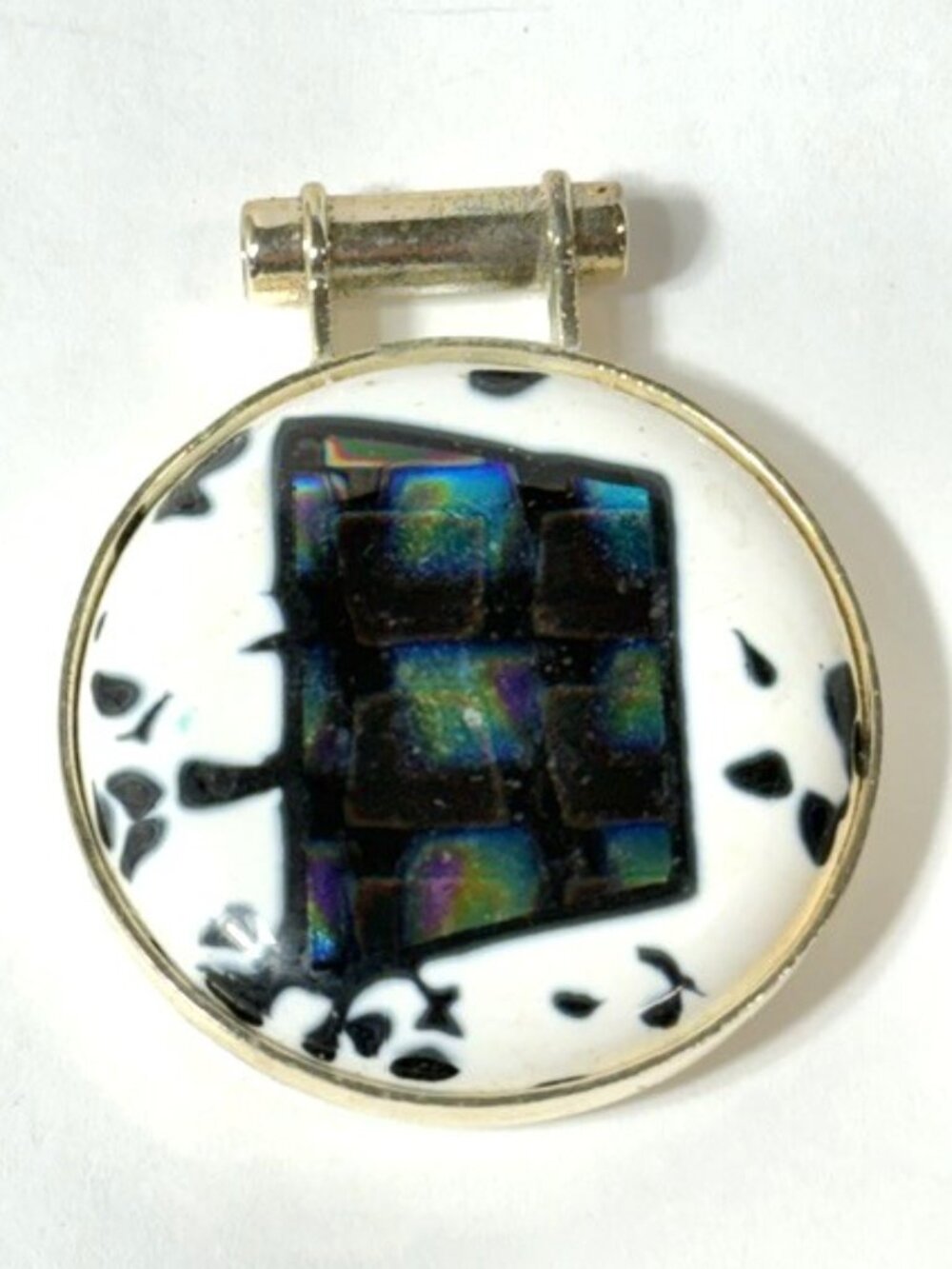 Silver and multi-colored round Venetian glass pendant.